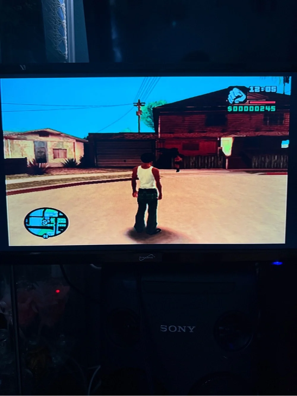 Sony PlayStation 2 Slim with Teal Transparent Controller and GTA: San Andreas